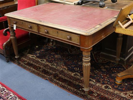 A Victorian Gillows style mahogany partners writing table W.136cm